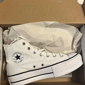 Never worn, platform converse high tops! Woman’s size 8